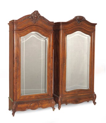 Lot 1469 - A Matched Pair of 19th Century French Kingwood and Rosewood Armoires, each with a moulded...