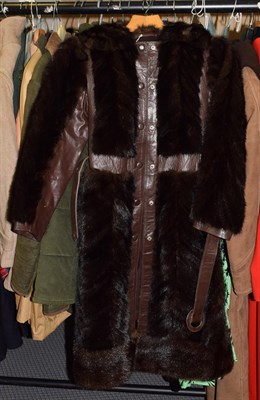 Lot 1055 - Brown leather and chevron cut mink coat, with press stud fastening, fur collar and matching leather