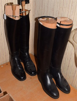 Lot 1078 - A pair of new John Lobb long black leather hunting boots with trees (size 5.5), and a pair of gents