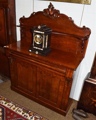 Lot 1173 - A Victorian mahogany chiffonier, raised gallery back with carved foliate scroll pediment and...