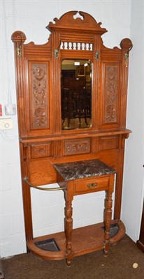 Lot 1178 - An Edwardian oak hall stand, central bevelled glass mirror, marble shelf and single drawer, 99cm by