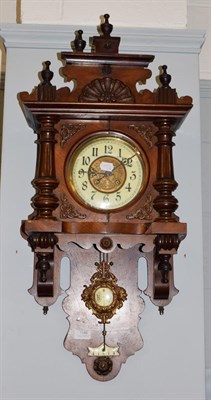 Lot 1186 - A late 19th/early 20th century mahogany veneered wall clock, 39cm by 83cm high