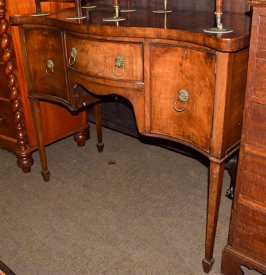 Lot 1210 - A 19th century mahogany serpentine sideboard, 120cm by 56cm by 96cm high
