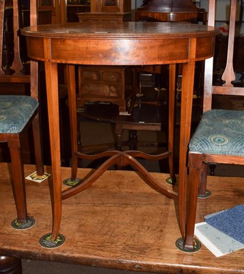 Lot 1220 - An Edwardian mahogany and inlaid oval centre table, square tapered legs, shaped X-stretcher,...