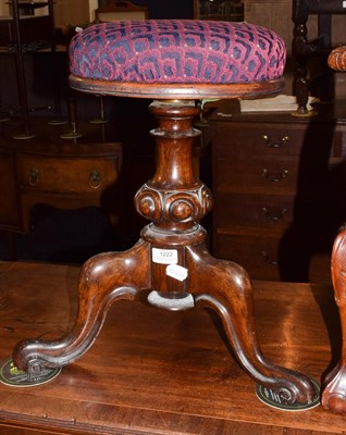 Lot 1222 - A 19th century mahogany adjustable piano stool with simulated rosewood grain and upholstered...