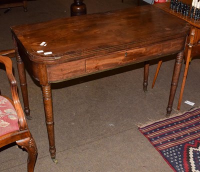 Lot 1228 - A 19th century rosewood crossbanded mahogany fold-over tea table, 104cm by 51cm by 75cm high