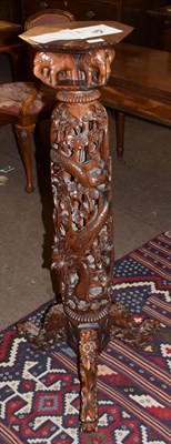 Lot 1230 - A Chinese carved wood pedestal, 116cm high