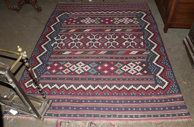 Lot 1231 - An Afshar flatweave rug, the polychrome field of bands of geometric devices enclosed by...