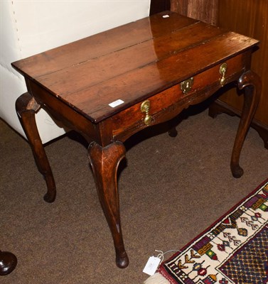 Lot 1237 - An 18th century side table, rectangular top above single drawer, brass drop handles, cabriole legs