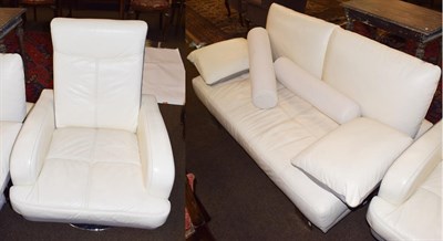 Lot 1243 - A modern leather two-seater sofa together with a matching swivel armchair