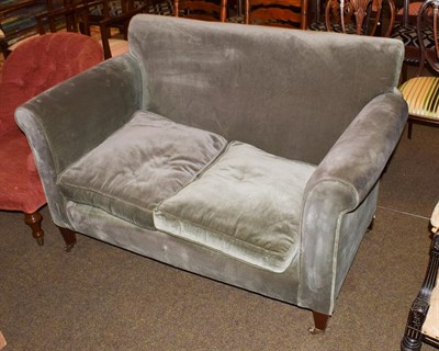 Lot 1251 - A Victorian two-seater sofa, drop end mahogany frame to castors, 140cm by 80cm by 89cm high