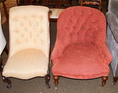 Lot 1252 - A Victorian button back armchair with mahogany frame to castors