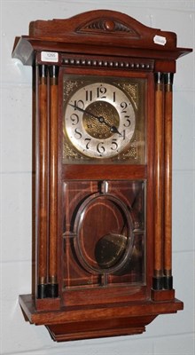 Lot 1255 - An Art Deco wall clock, the dial with Arabic numerous and silvered chapter ring, above a glazed...