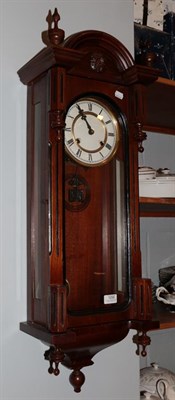 Lot 1256 - A walnut Vienna style striking wall clock