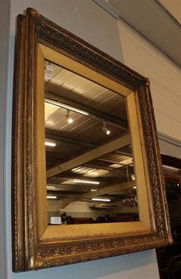 Lot 1257 - A 19th century gilt and gesso picture frame, with later mirror insert, 72cm by 83cm high