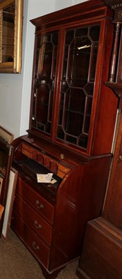 Lot 1258 - An Edwardian mahogany and satinwood bureau bookcase, moulded cornice above twin glazed doors,...