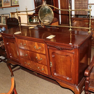 Lot 1271 - An early 20th century mahogany sideboard, gilt metal gallery back with central circular mirror,...