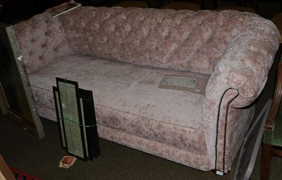 Lot 1272 - A Chesterfield style sofa, early 20th century, with ''Damask Rose'' button-back upholstery,...