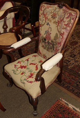 Lot 1279 - A 19th century mahogany open armchair, tapestry seat and back, outswept arms, cabriole legs to...