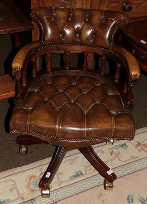 Lot 1288 - A Berkeley Collection swivel chair