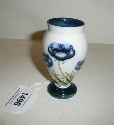 Lot 1496 - A William Moorcroft Macintyre Miniature Poppy Pattern Vase, circa 1905, in blue and sage green,...