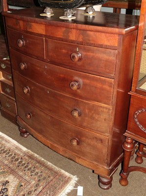 Lot 1318 - A Victorian mahogany bow-front chest of two short over three long drawers, 105cm by 53cm by...