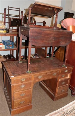 Lot 1319 - A late 19th century oak kneehole pedestal desk, leather inset, arrangement of nine drawers,...