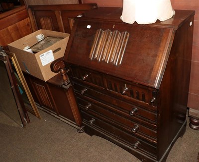 Lot 1320 - A 20th century oak metamorphic Monk's bench, with linen-fold panels, 94cm by 55cm deep;...