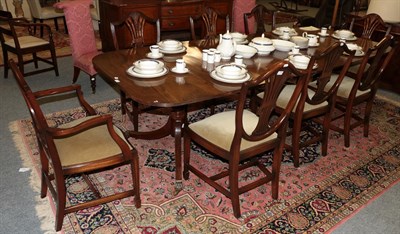 Lot 1354 - A set of eight mahogany Hepplewhite style dining chairs including two carvers