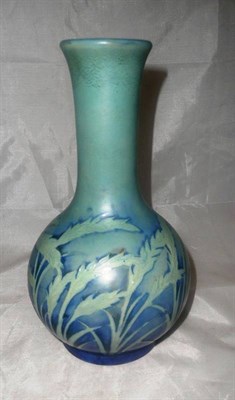 Lot 1504 - A William Moorcroft Waving Corn Pattern Vase, circa 1930's, of globular design with elongated neck