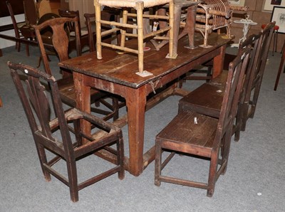 Lot 1381 - A set of eight Provincial oak dining chairs, each with urn form splats and yoke crest rails...