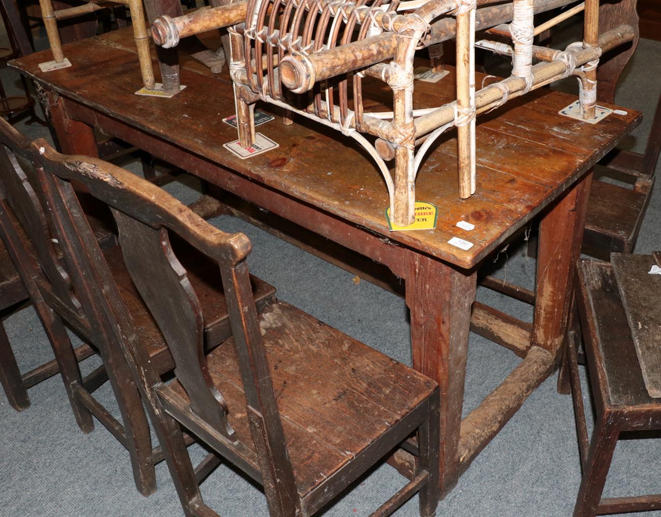Lot 1382 - A Provincial plank-top farmhouse kitchen table, 168cm by 72cm by 78cm high