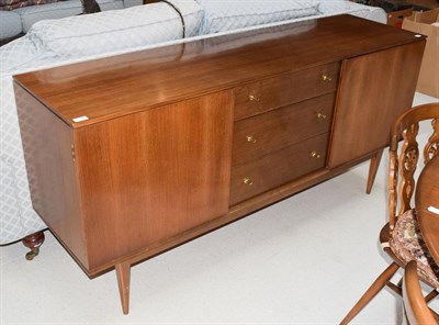 Lot 1395 - A 1950's teak sideboard by Wrighton, 168cm by 46cm by 80cm high