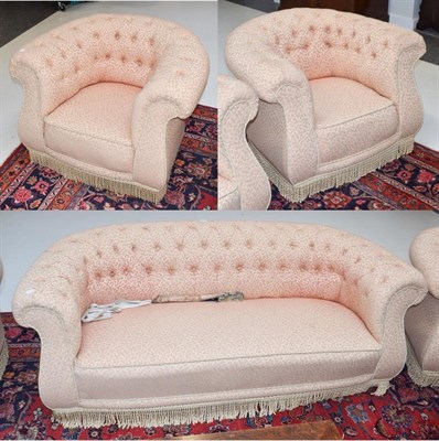 Lot 1409 - An Early 20th century Chesterfield three-piece suite upholstered in buttoned fabric, comprising...