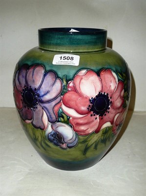 Lot 1508 - A Walter Moorcroft Anemone Pattern Ginger Jar, on a green/blue ground, impressed factory mark...