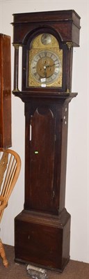 Lot 1425 - ~ An oak eight day longcase clock, dial with circular disc in the arch inscribed Jno Charlton...