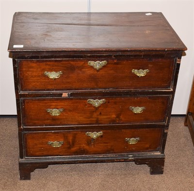 Lot 1432 - A Provincial early 19th century oak three-height chest of drawers, 73cm by 42cm by 72cm high