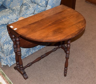 Lot 1445 - A 19th century mahogany Sutherland table raised on turned, reeded and gadrooned legs, 101cm...