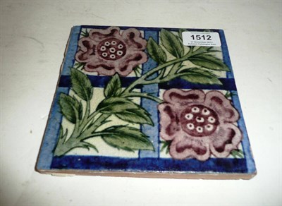 Lot 1512 - A William De Morgan Rose Trellis Tile, painted in shades of blue and green impressed W. DE MORGAN &