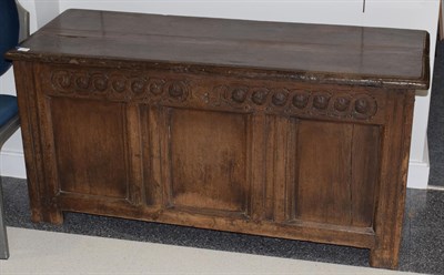 Lot 1465 - A late 17th century joined oak chest, the hinged lid above a guilloche carved frieze with...