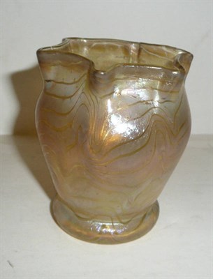 Lot 1536 - A Loetz Iridescent Glass Vase, circa 1900, trailed iridescent yellow body with pinched rim,...