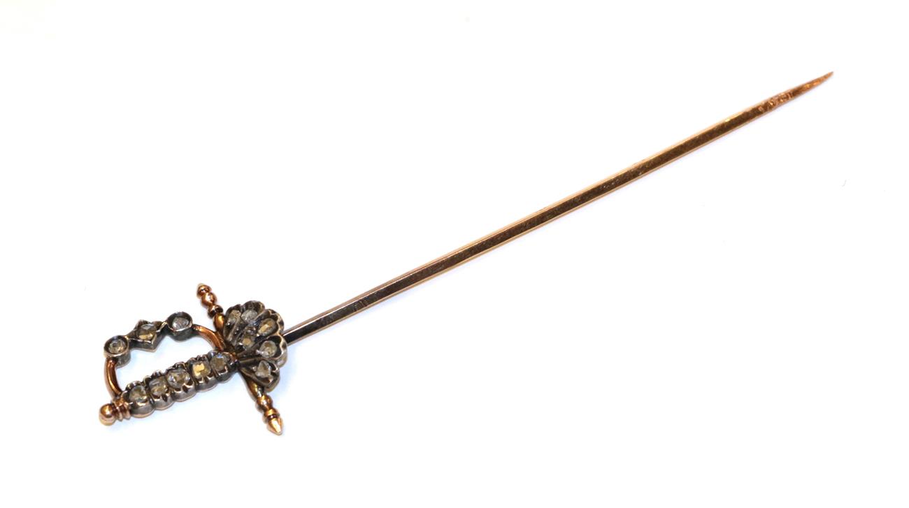 Lot 9 - A French diamond sword stickpin, the hilt set throughout with rose cut diamonds, in white claw...