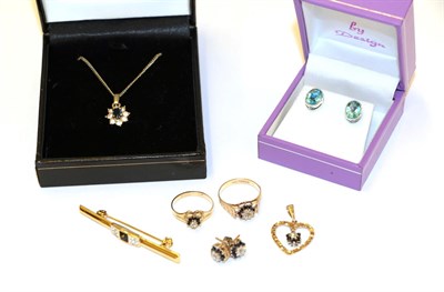 Lot 10 - A collection of jewellery including a 9 carat gold sapphire and diamond heart pendant; a pair...