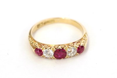 Lot 22 - A synthetic ruby and diamond five stone ring, three graduated round cut synthetic rubies...