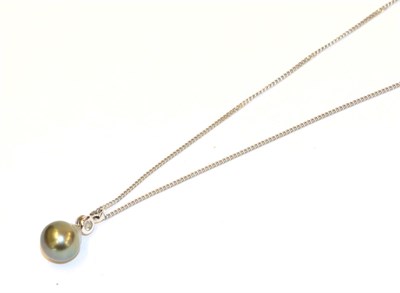 Lot 31 - A grey cultured pearl and diamond pendant on a 9 carat white gold chain, the grey cultured...