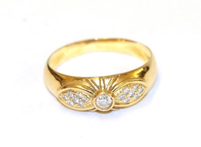 Lot 34 - A diamond ring, the bow motif set throughout with round brilliant cut diamonds with the largest...