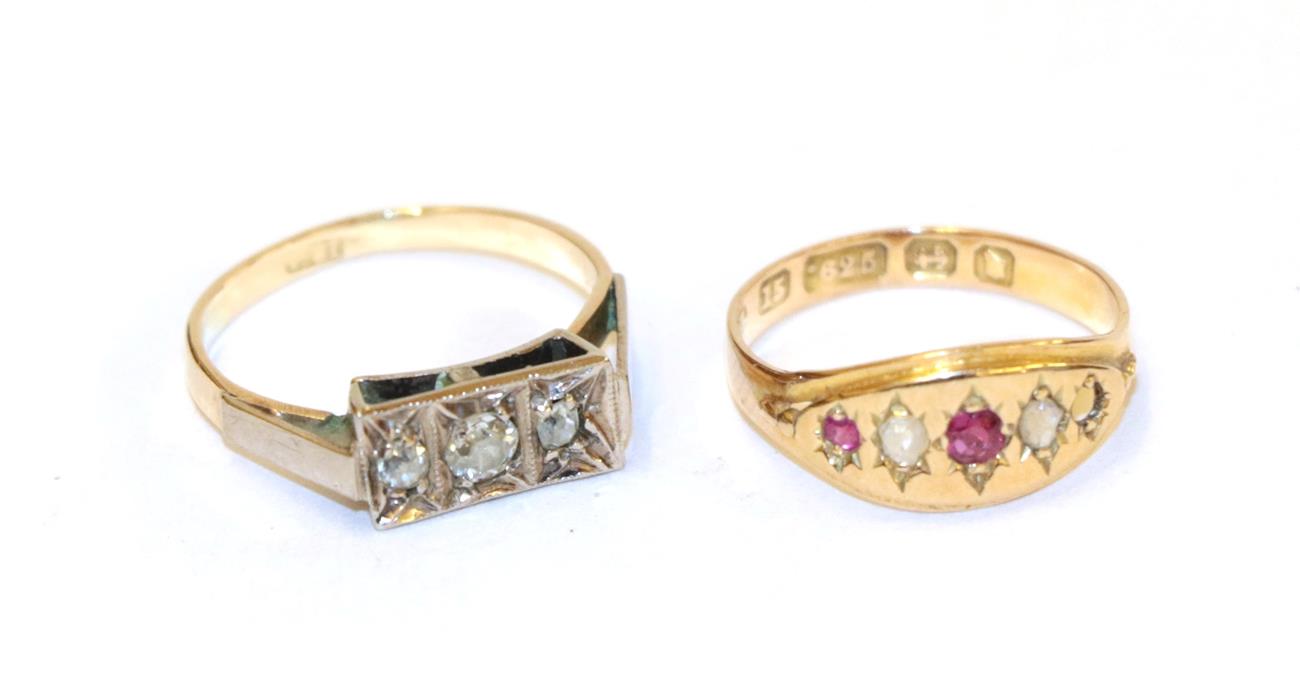 Lot 38 - A diamond three stone ring, the old cut diamonds in white claw settings, to a yellow tapered...