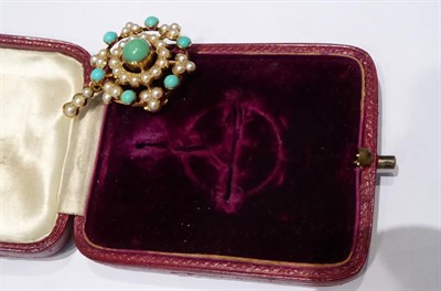Lot 64 - An Edwardian split pearl and turquoise brooch/pendant, of target design, the round turquoise...