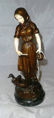 Lot 1550 - Henryk Kossowski (1855 - 1921): A Bronze and Ivory Figural Group, modelled as a peasant girl...