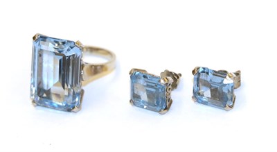Lot 81 - A blue synthetic spinel ring and matching earrings, the emerald-cut blue synthetic spinels in white